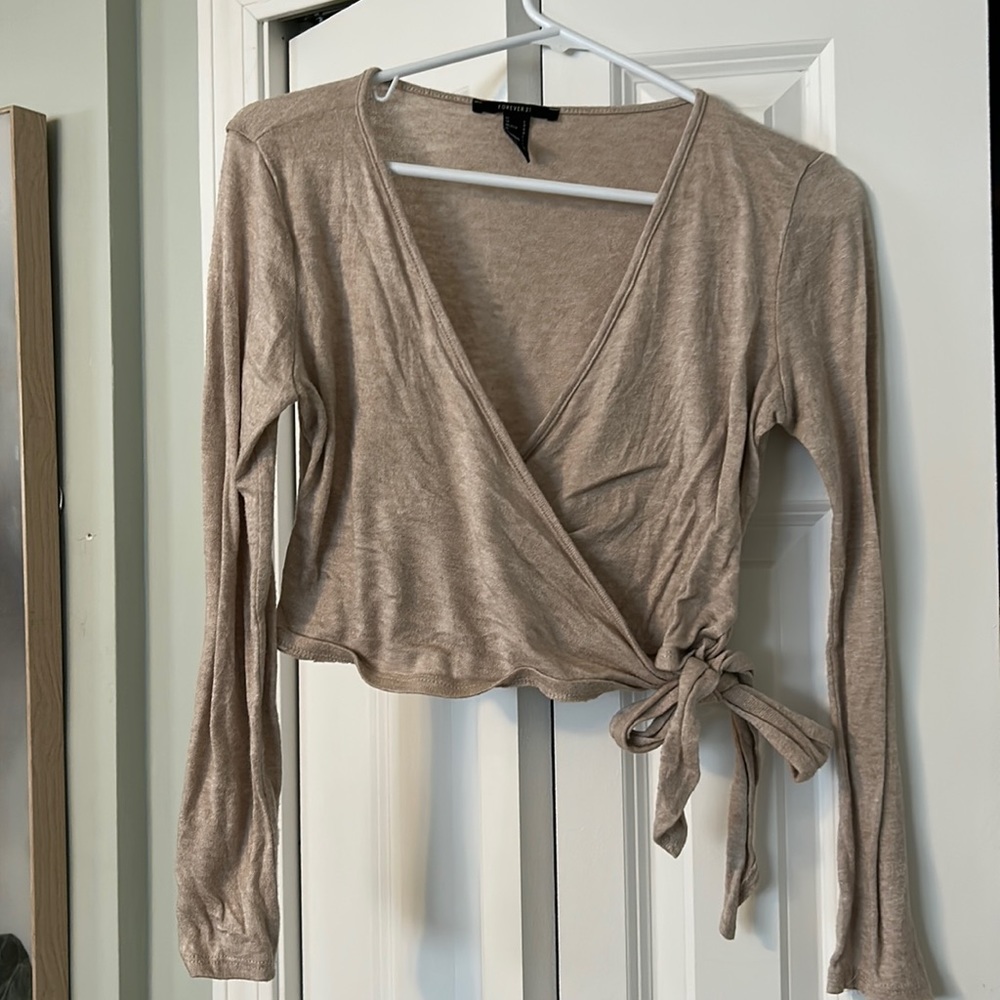 Forever 21 size L. It comes small I am usually a M